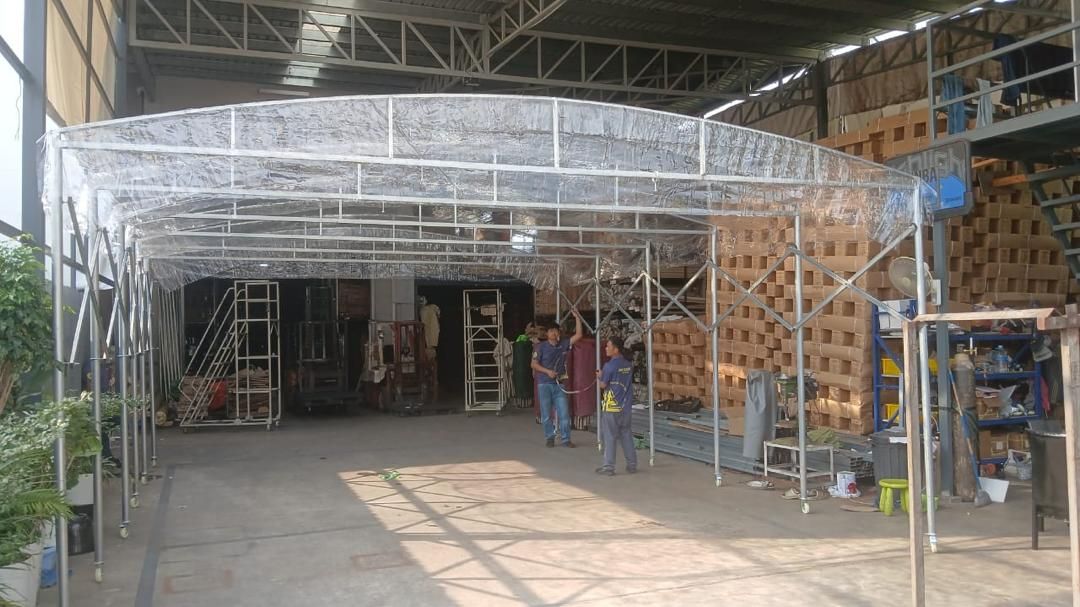 Clear halfmoon canopy inside a warehouse